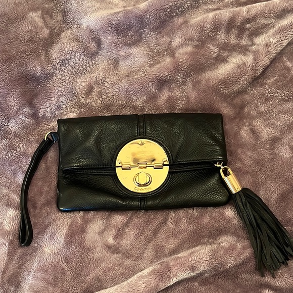 Calvin Klein Handbags - Calvin Klein black leather clutch